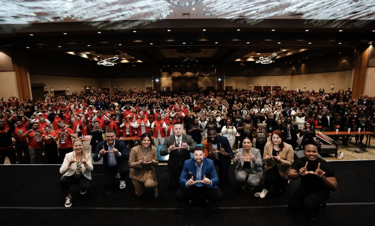 Leaders on stage at formal event